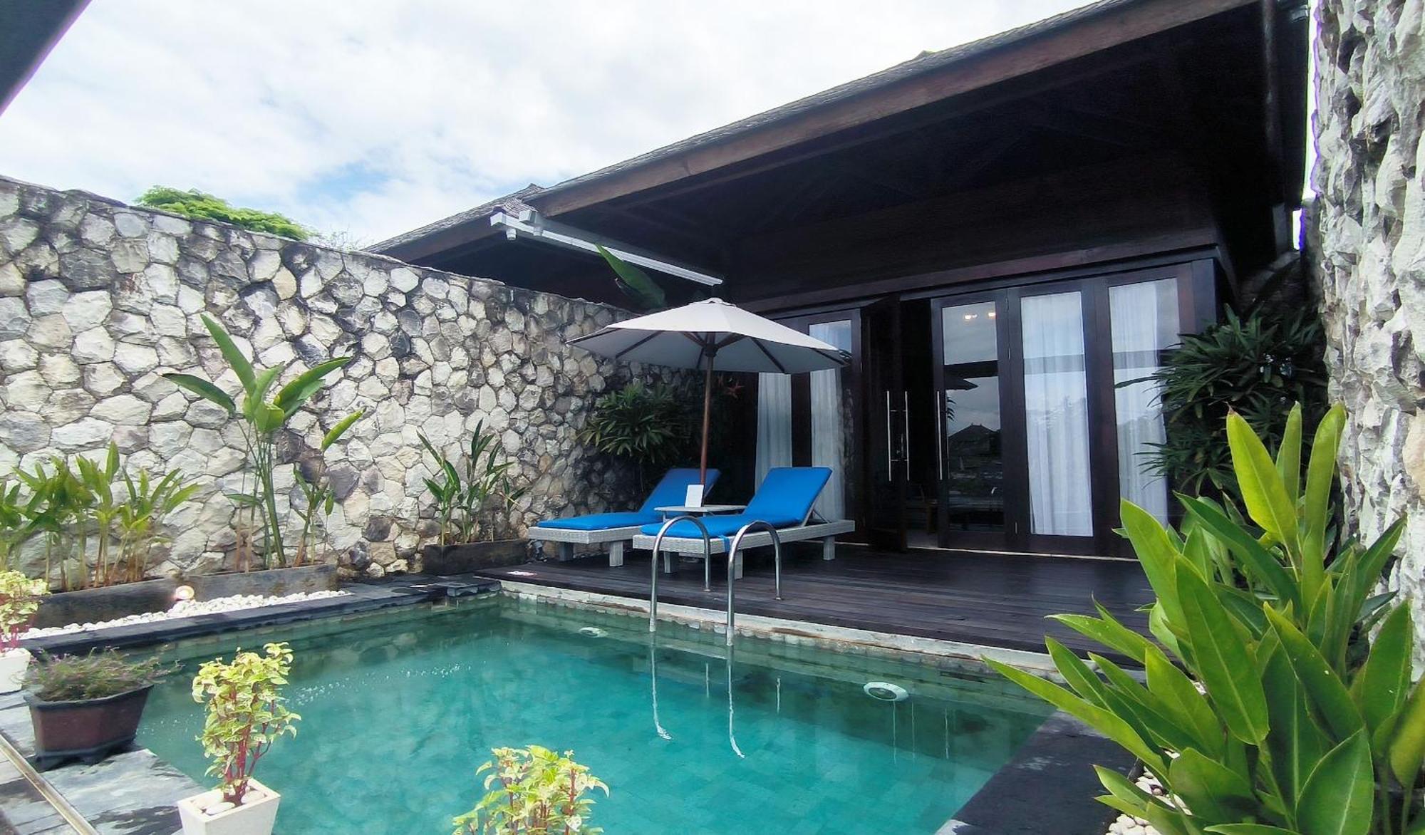 Wyndham Tamansari Jivva Resort Bali Siyut Exteriér fotografie A pool villa at the resort