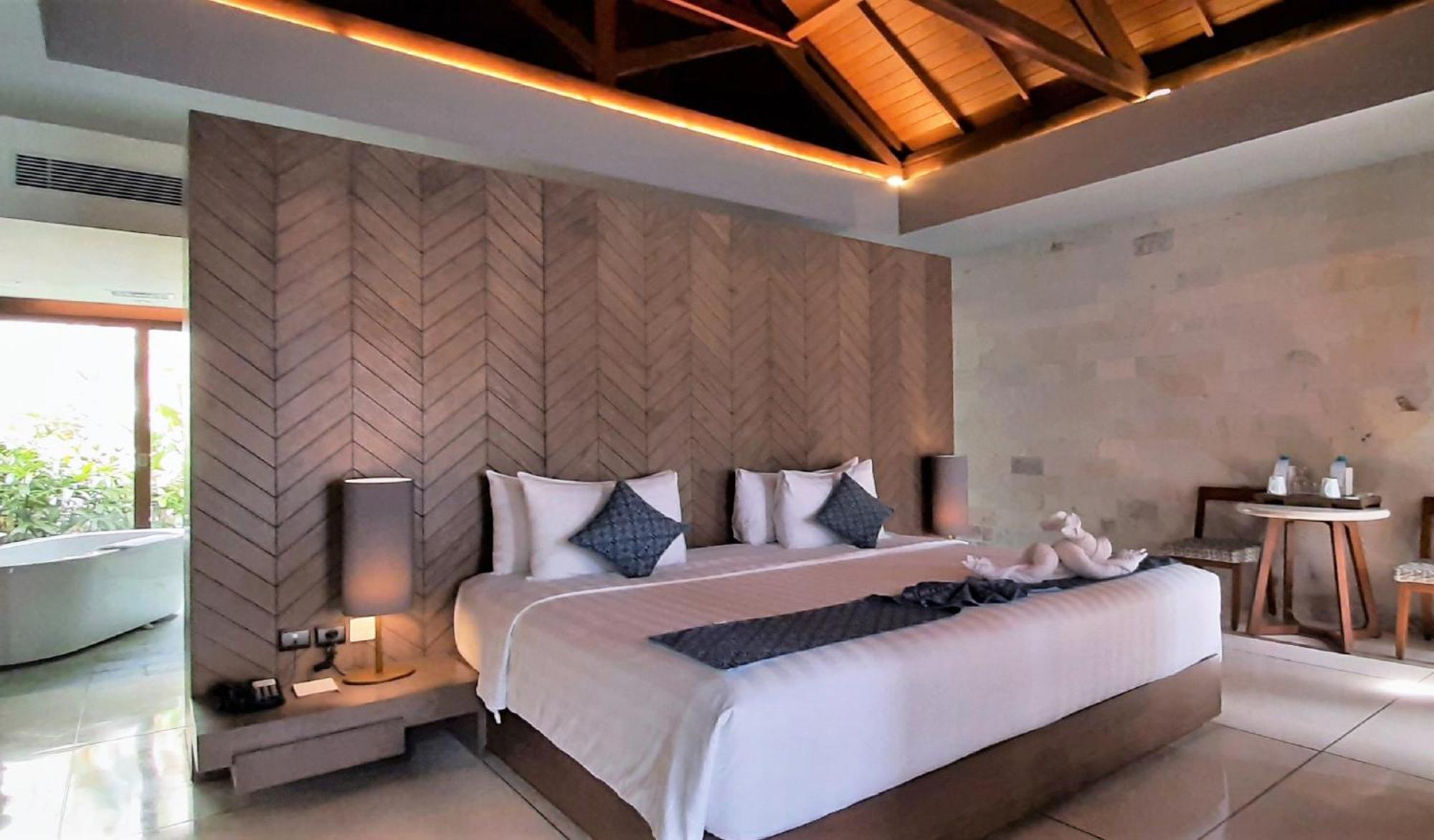 Wyndham Tamansari Jivva Resort Bali Siyut Exteriér fotografie A bedroom at the resort